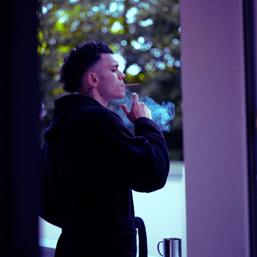 Spontaneous shot smoking on the balcony